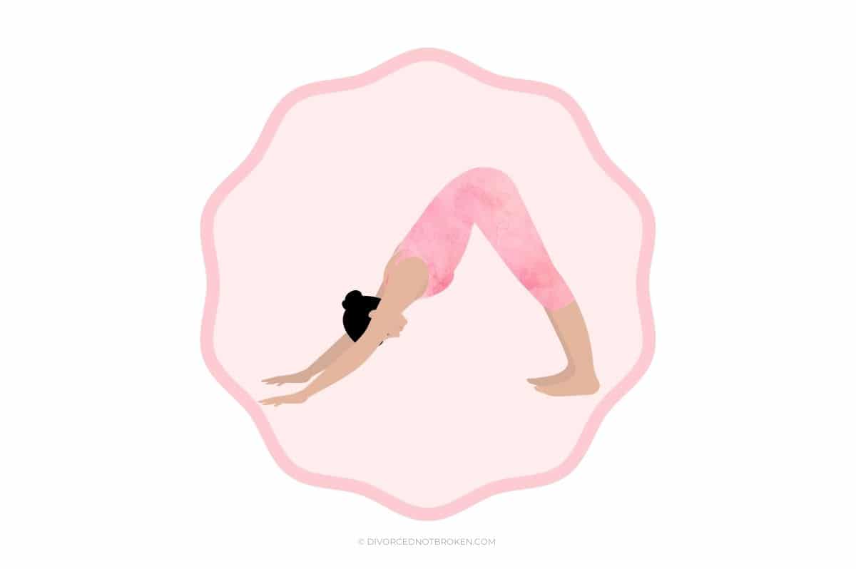 Woman with black hair in downward dog yoga pose post. 
